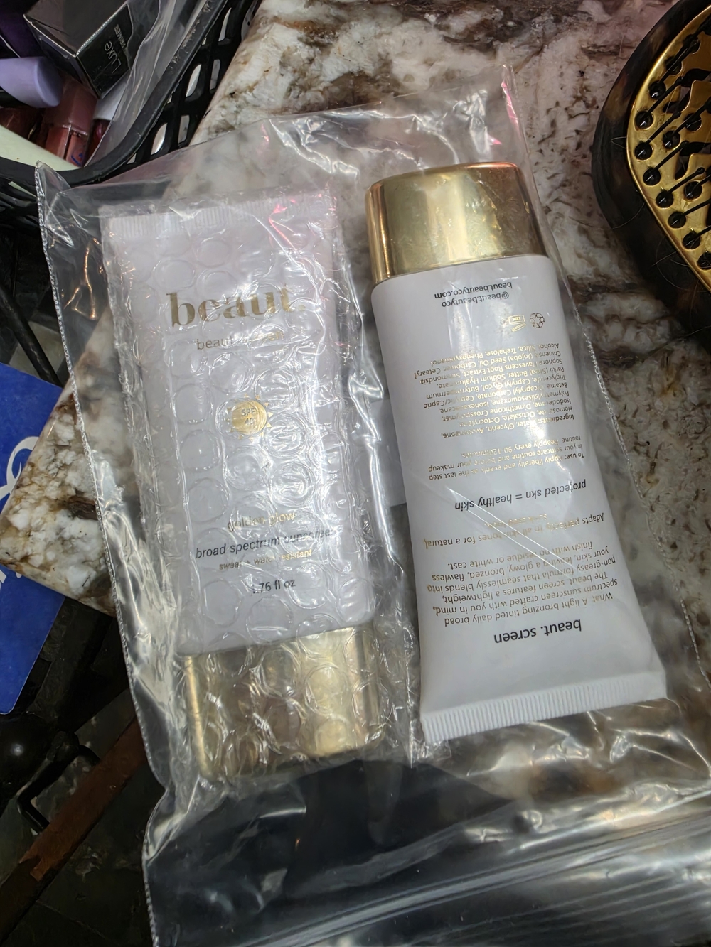 Never opened!Beaut Broad Spectrum Sunscreen with Gold Cap - White & Gold